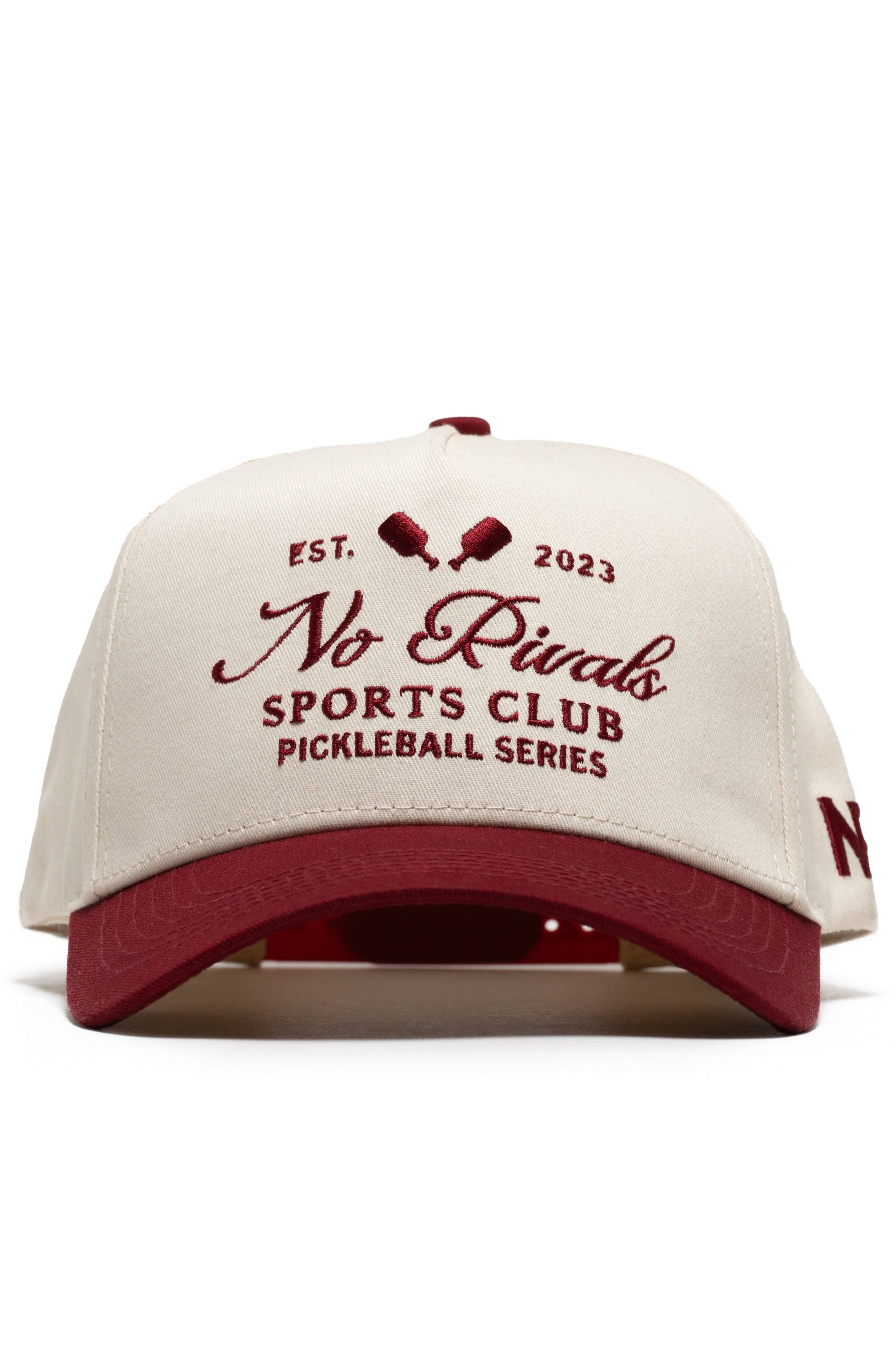 The No Rivals Sports Club Pickleball Hat - Classic Red features a structured snapback design with “Sports Club Pickleball Series Est. 2023” and two pickleball paddles embroidered on the front in premium cotton.