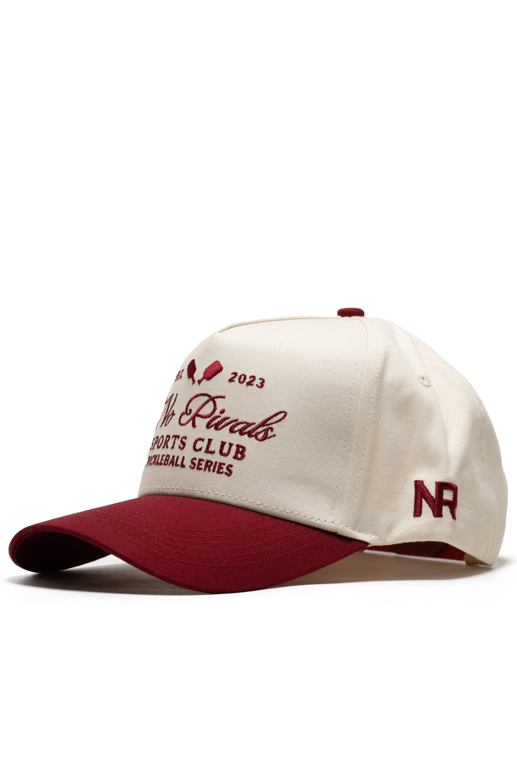 The No Rivals Sports Club Pickleball Hat - Classic Red is a snapback cap in cream and maroon with "2023 Rivals Sports Club Pickleball Series" on the front, NR stitched on the side, and a structured fit with high-quality cotton, maroon visor, and matching top button.