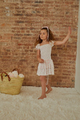 Lexi White With Pastel Pink Ditsy Satin Smocked Short Sleeve Ruffle Dress