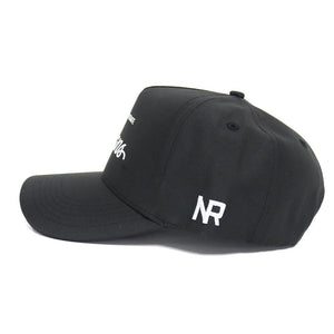 The Tarleton Athletic Legacy Hat by No Rivals is a black baseball cap with white NR embroidery on the left side and a snapback closure, displayed from a side angle on a plain white background.