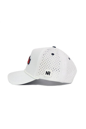 The Ole Miss Gameday Hat by No Rivals is a white cap featuring side and back perforations, curved brim, NR logo patch, red and blue front embroidery, and an adjustable snap back for the perfect fit.