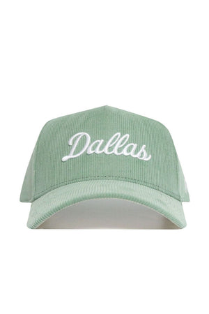 Introducing the No Rivals Dallas Corduroy Hat from the Spring Showers Collection—a structured snapback in spring green corduroy, featuring "Dallas" embroidered in white script on the front and an adjustable fit for comfort.