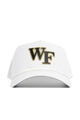 The Wake Forest Gameday Hat is a white snapback cap with bold black and gold WF embroidery, officially licensed and perfect for completing your gameday look.