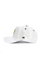 The Wake Forest Gameday Hat is a white baseball cap with ventilation holes, a curved brim, and a black NR logo patch on the side. This officially licensed hat is shown in profile against a plain white background.