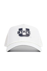 The Utah State Gameday Hat is a white baseball cap with a bold black and gray "U" and "STATE" on the front. It features a snap back for a customized fit, shown from the front on a plain white background—perfect for gameday.