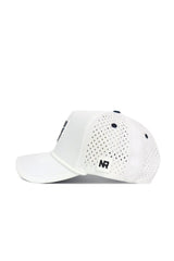The Utah State Gameday Hat is a white baseball cap with side ventilation holes, a curved brim, snapback closure, and a small NR logo patch near the back—ideal for your next Gameday Fit.