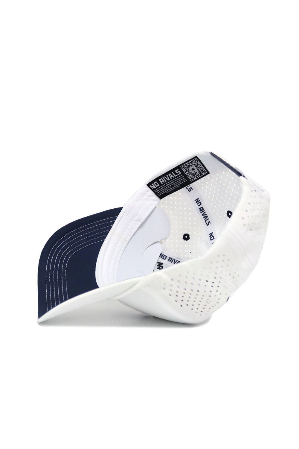 A close-up of the Utah State Gameday Hat, featuring white and navy perforated panels, NO RIVALS branding inside, a QR code on the inner band, and a Snap Back Adjustment for your perfect fit.