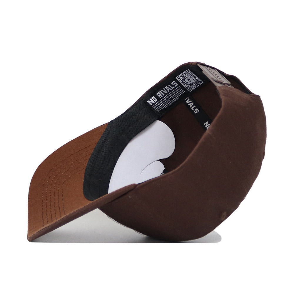 The Georgia Southern Americano Hat, a brown snapback, is shown upside down to reveal its black interior lining and NO RIVALS labels. Made from high-quality cotton, it features a structured fit with a white insert and a matching brown brim underside.