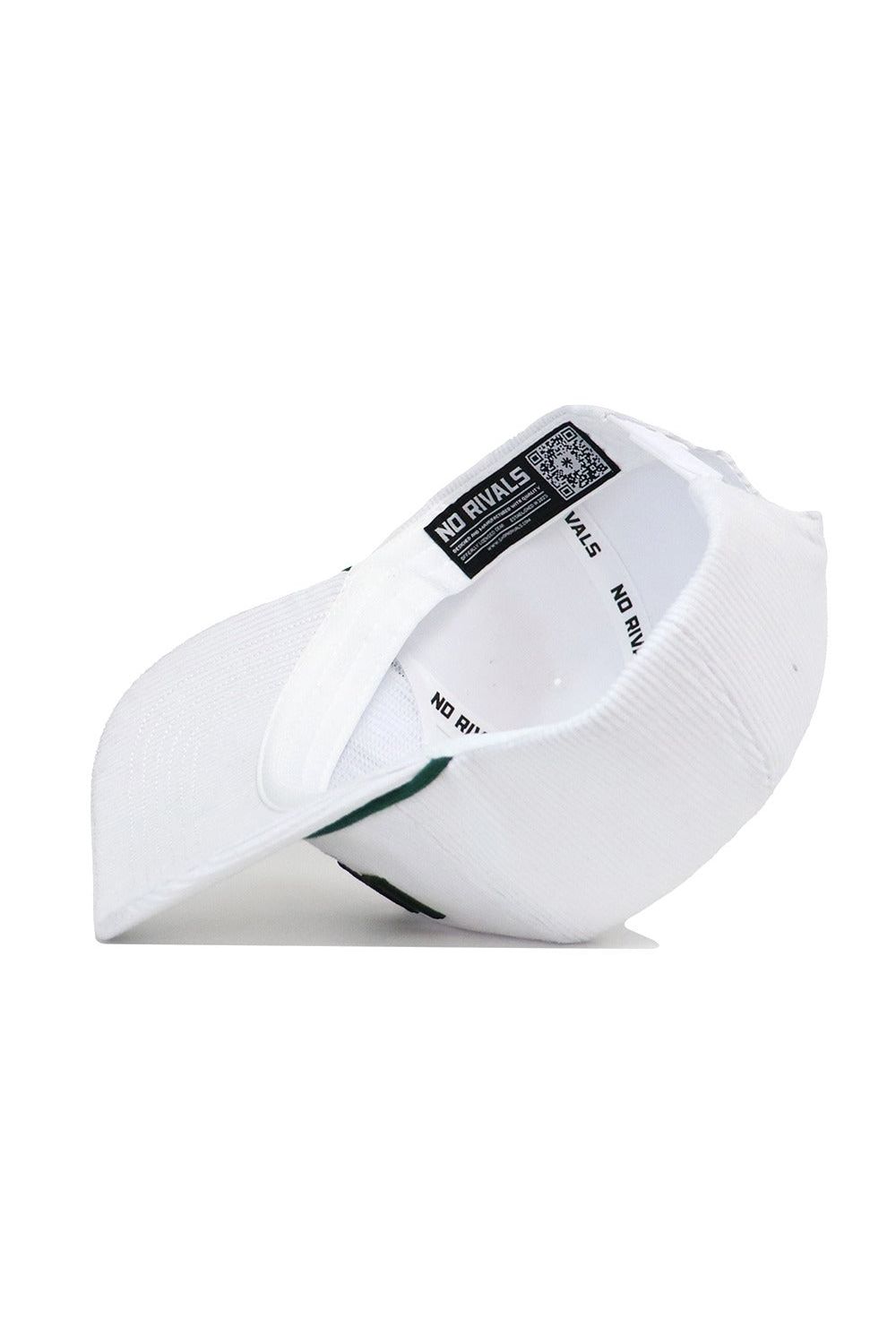 The St.Pattys Lucky Cord Hat - White by No Rivals is shown inside out, revealing the NO RIVALS label, inner lining, and a QR code on the tag.
