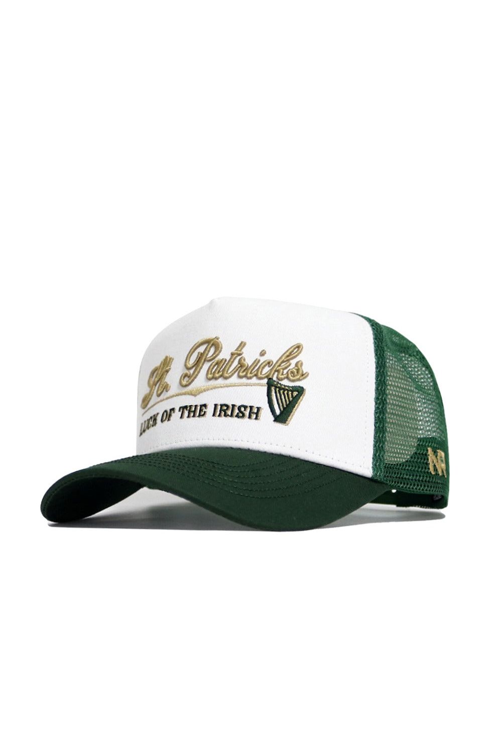 The No Rivals St.Pattys Trucker Hat is green and white with mesh sides, an unstructured fit, adjustable snap back, and gold script reading "St. Patricks" above "LUCK OF THE IRISH," finished with a gold harp graphic on the front.