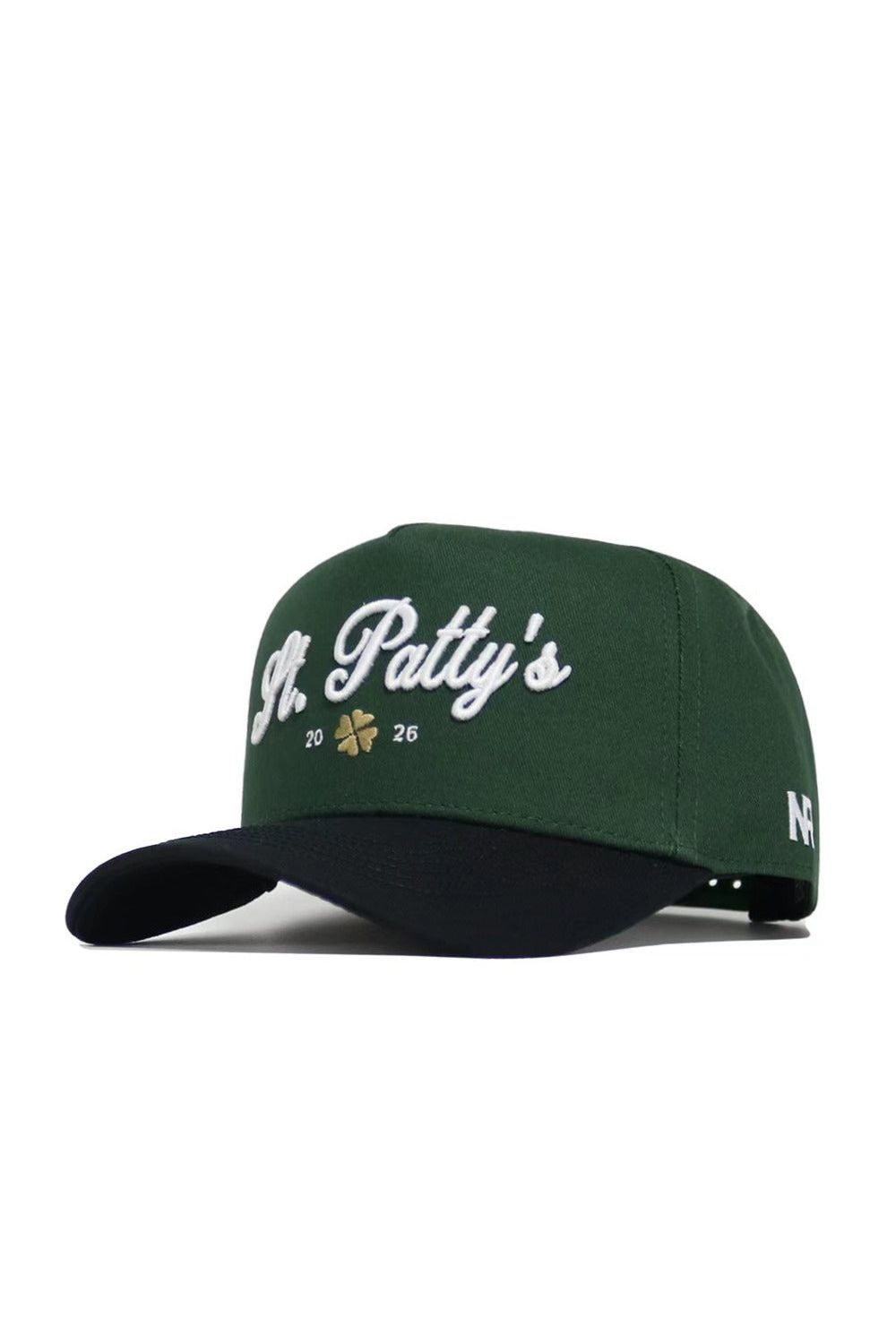 The No Rivals St.Pattys Shamrock Hat features green and black corduroy, "St. Pattys 2026" in white embroidery on the front with a gold shamrock between the numbers, a white NF logo on the side, and an adjustable snap back.