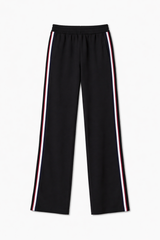 Black pants with a button detail on a white background